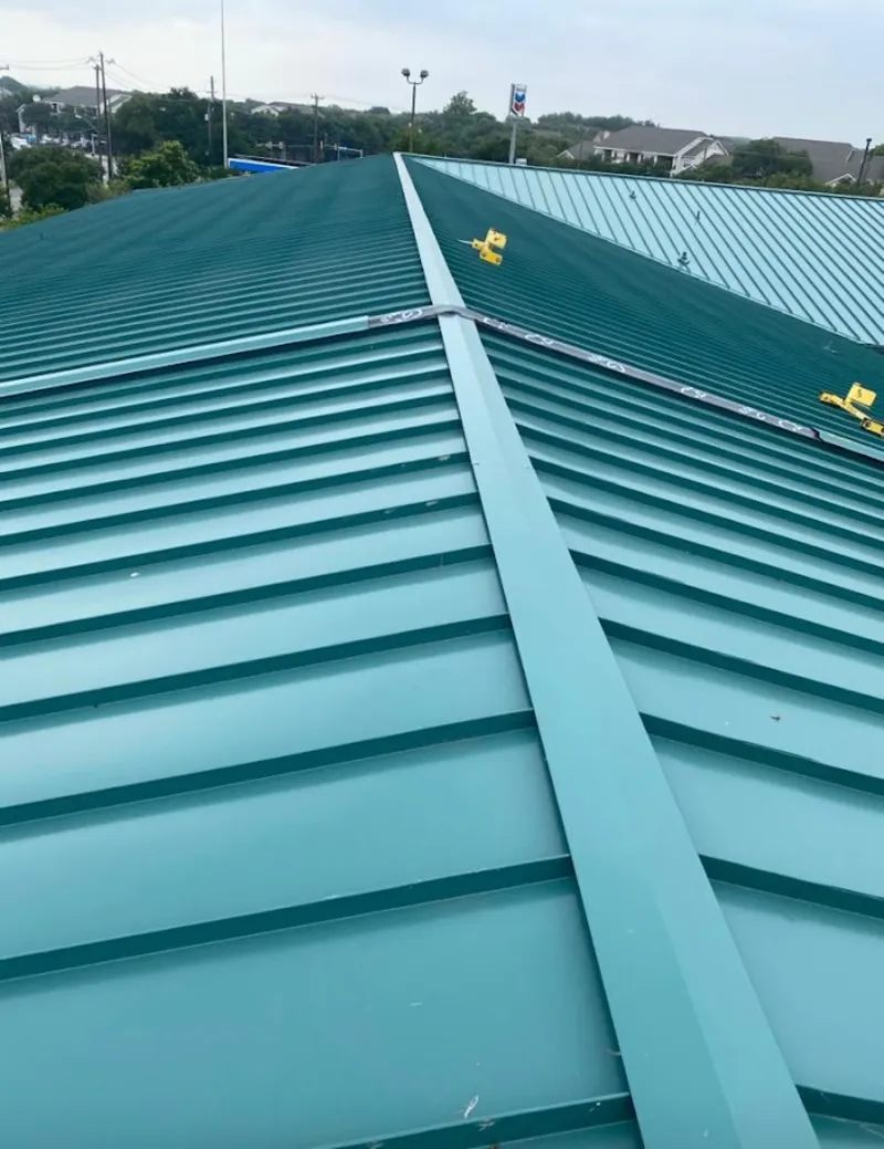 Green commercial metal roof ridge and valley for Metal Roof Repair in Lakeland South