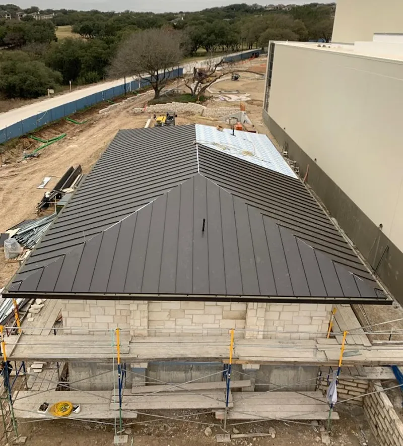 Metal roof new construction with scaffolding in Lakeland South